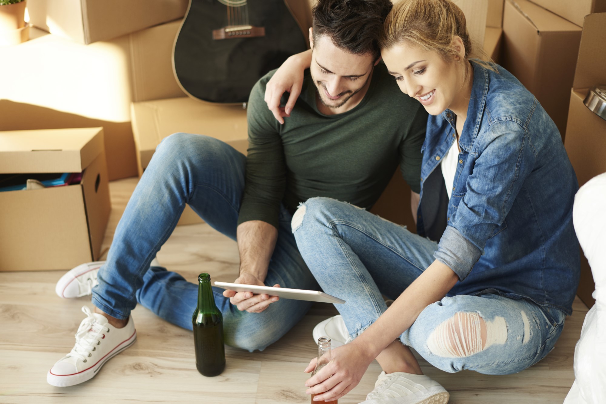 young couple learning the Top Benefits of Hiring a LOCAL Property Management Company in Northern Arizona